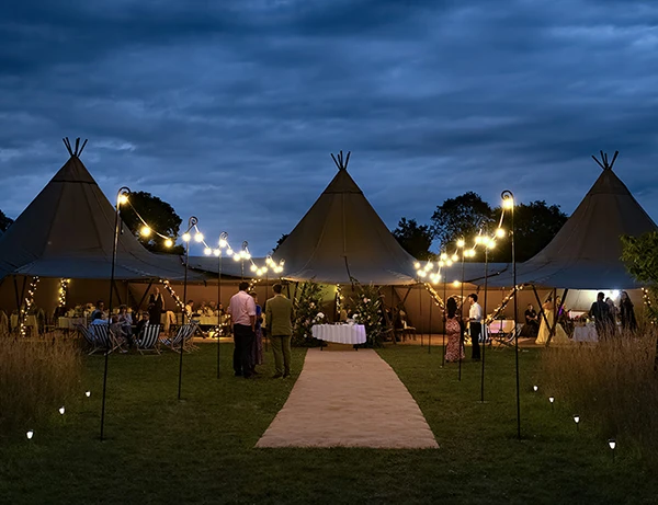 Beautiful double tipi at twilight for an Essex wedding